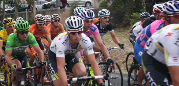 A flat stage means the peleton comes and goes in the blink of an eye. I was camera boy this time and manged to fluke a snap of the yellow (Tommy Voelker) and green jersey's (Mark Cavendish) firing up for the finish. (July 17, 2011)
